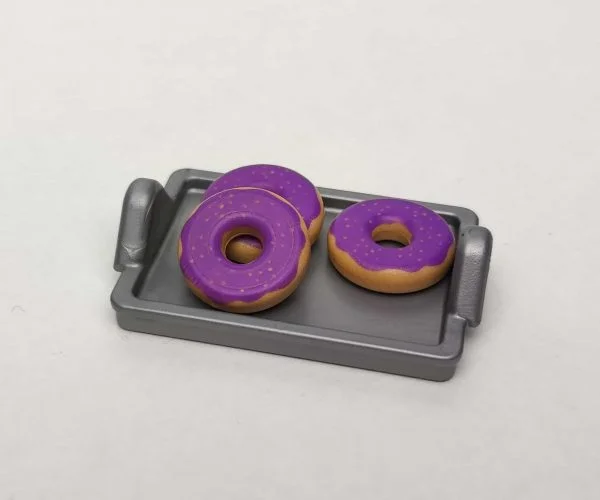 Bandeja de donuts lilas