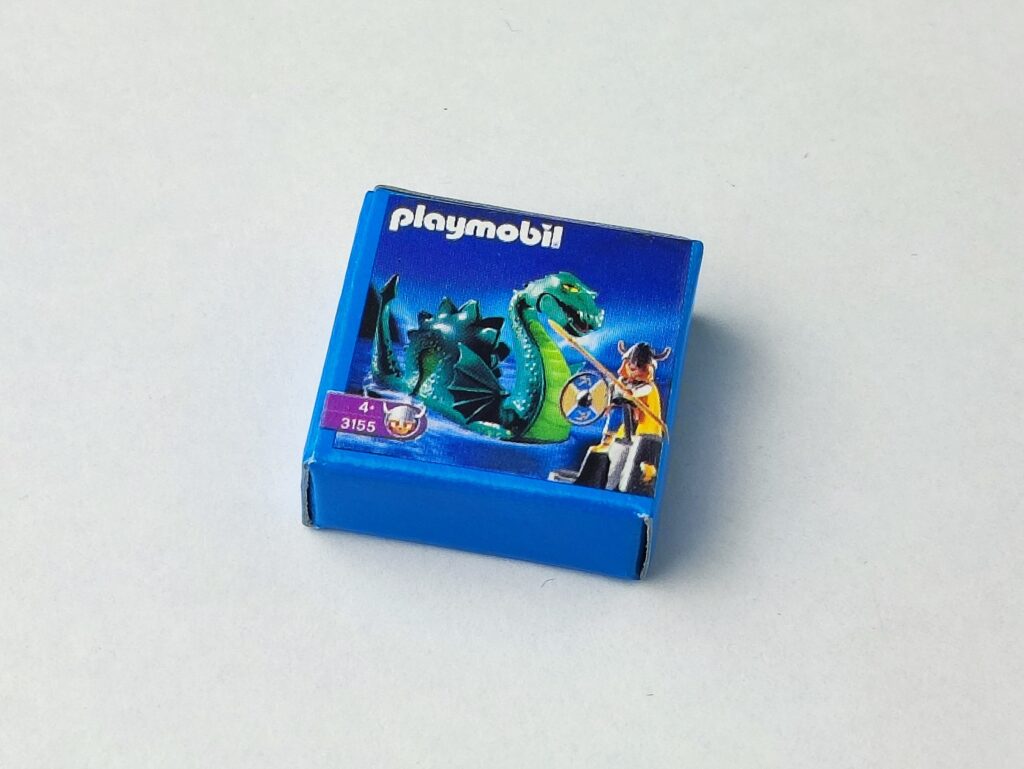 Cajita en miniatura de juguetes dragon verde