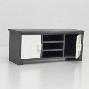 Mueble bajo de color gris con puertas de color blanco