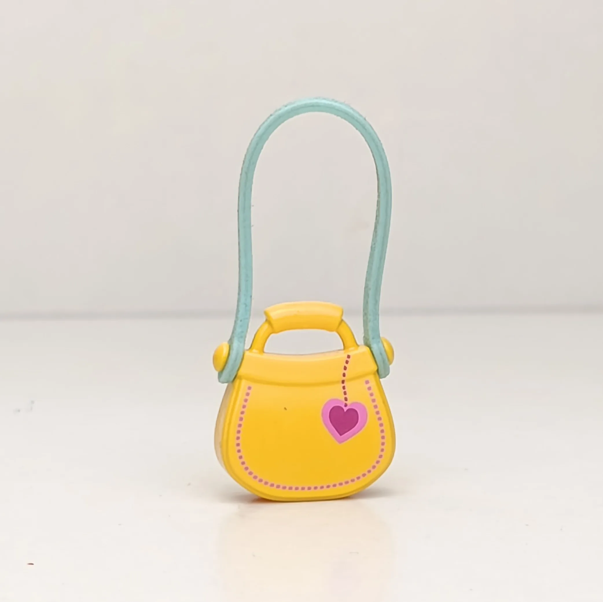 Bolso amarillo con asa larga