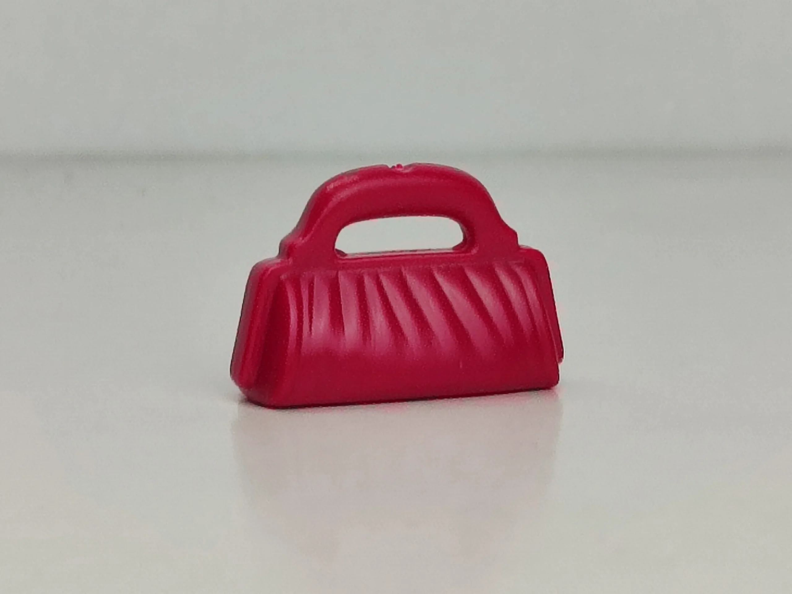 Bolso pequeño de color fucsia