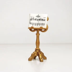 Atril musical de color dorado con partitura